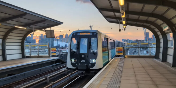 New DLR train pulling into Pontoon Dock