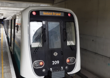New DLR B23 train bound for Woolwich Arsenal leaving the station.
