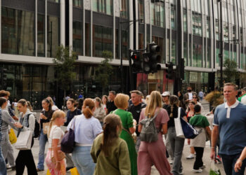 A lively scene of pedestrians walking along Oxford Street, reflecting the vision of a fully pedestrianised high street.