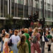 A lively scene of pedestrians walking along Oxford Street, reflecting the vision of a fully pedestrianised high street.
