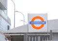 London Overground roundel outside a station in London