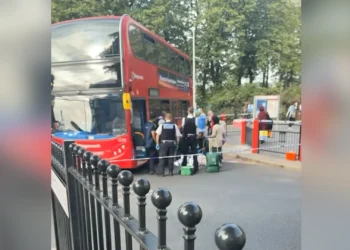 Police and emergency responders beside a bus at Walthamstow Bus Station